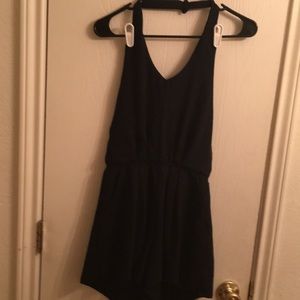 Navy blue halter style romper with pockets